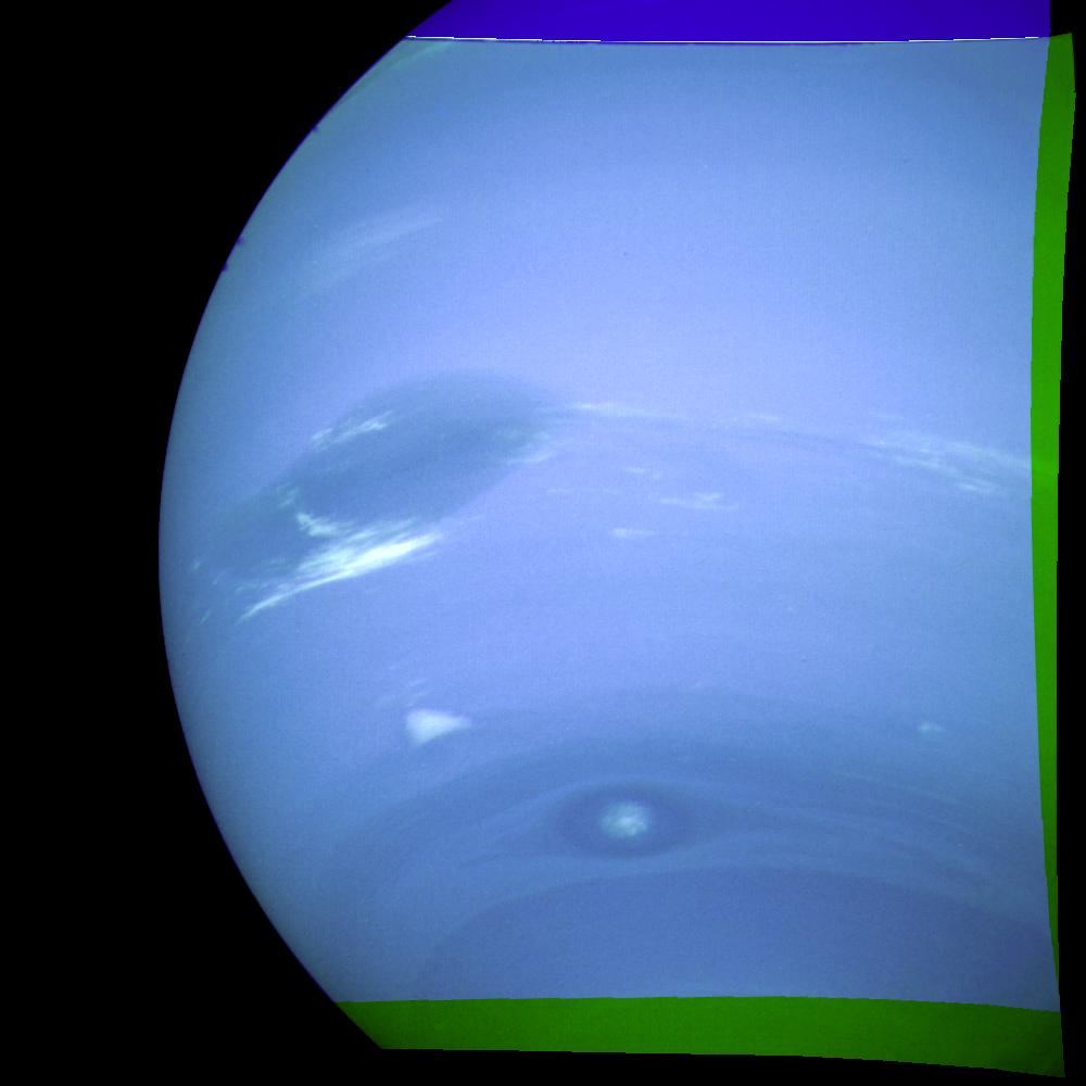 Neptune's blue clouds showing the Great Dark Spot, a small bright cloud called Scooter and a second dark spot