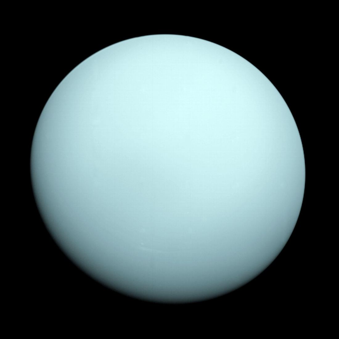 A smooth, pale blue-green Uranus photographed by Voyager 2 in 1986